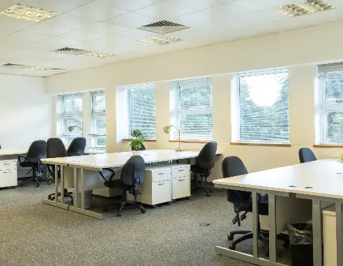 An office with white tables.