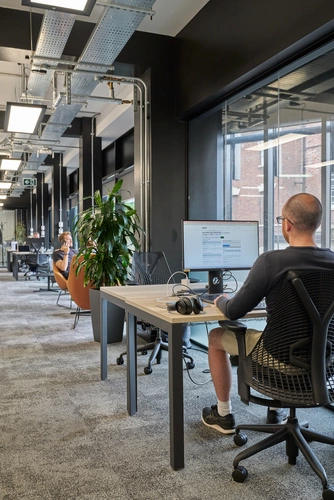 Coworking area in Origin Workspace