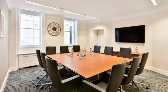 An office space with meeting rooms.