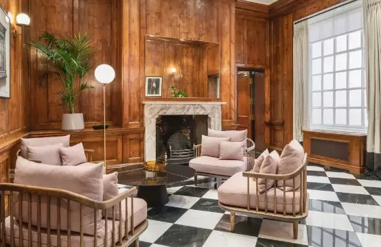 An office with a fireplace.