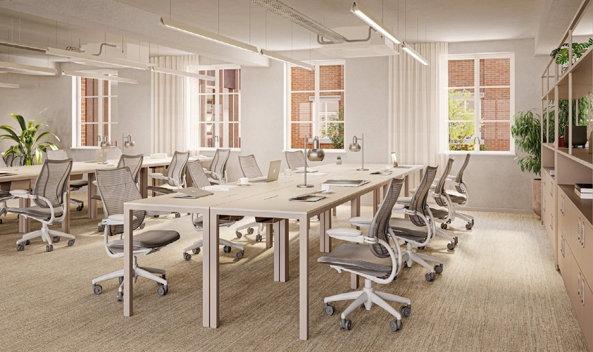 Office space at FORA Chancery Lane filled with many beige chairs, beige carpet and four windows in the background