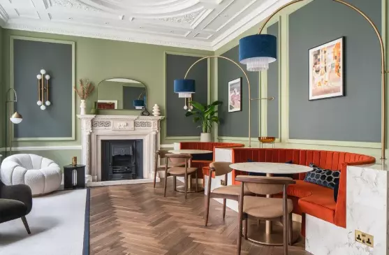 An office space with paintings.