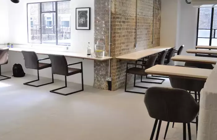 CitySpace Borough coworking area with exposed brick book on demand.png