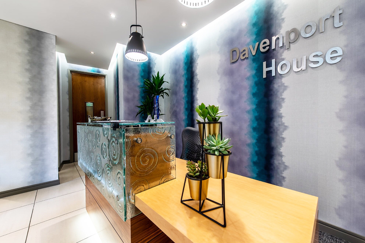 Reception at Davenport House Offices in London with tie dye wallpaper 