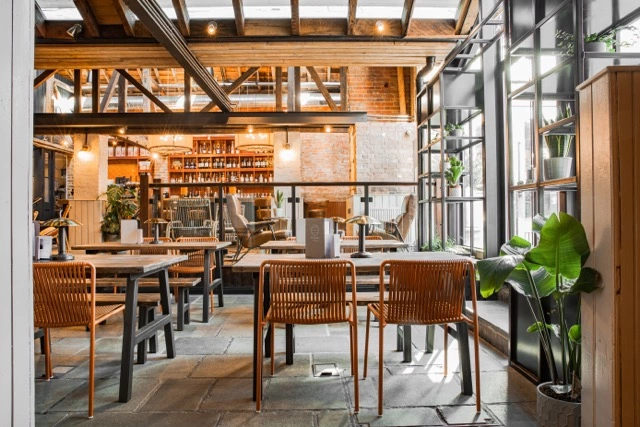 Beautifully lit coworking space with plants at the Hub on Veralum in St Albans